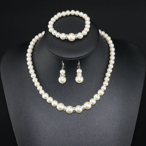 Three-piece Pearl Necklace  Bracelet  And  Earrings